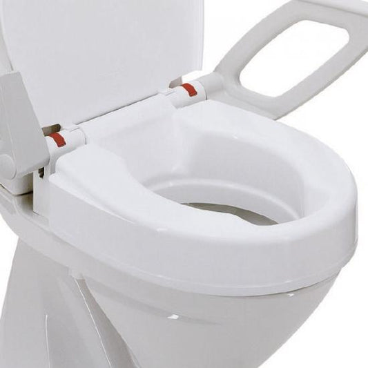 Aquatec 90000 raised toilet seat in situ in a bathroom, highlighting large hygiene recess and secure clip-on installation.