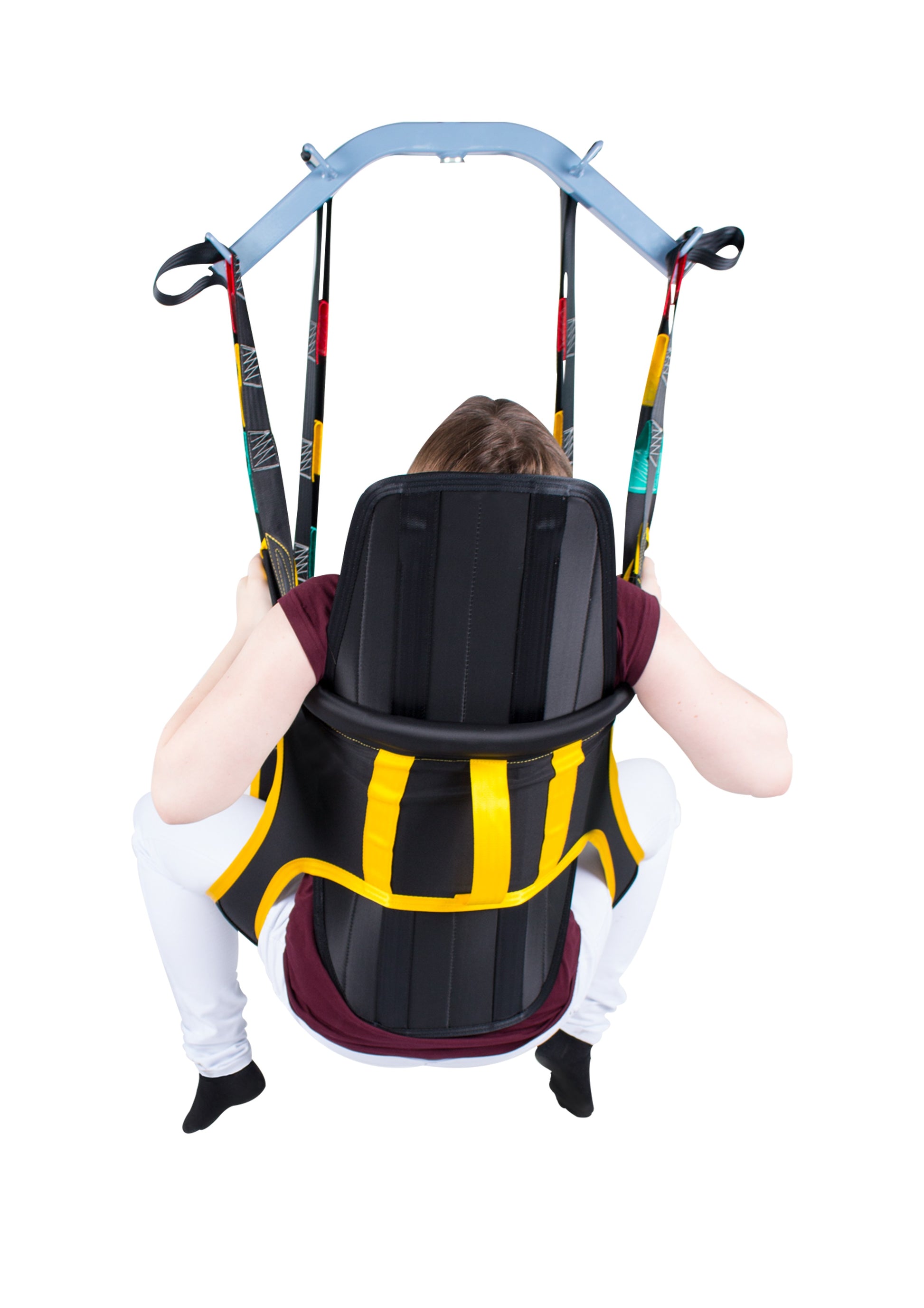 Wellell Quick Transfer Sling in use with patient during ground-level transfer, showcasing full-body support.