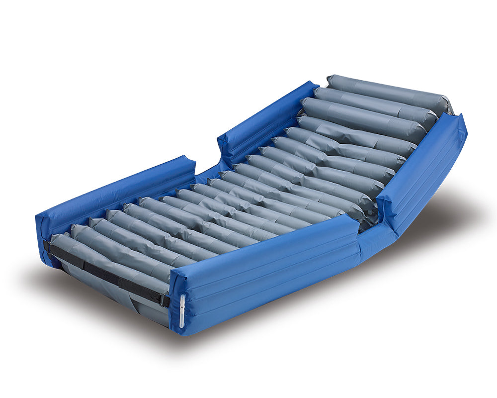 Mattress showing low air loss cells and 2-inch foam base layer.