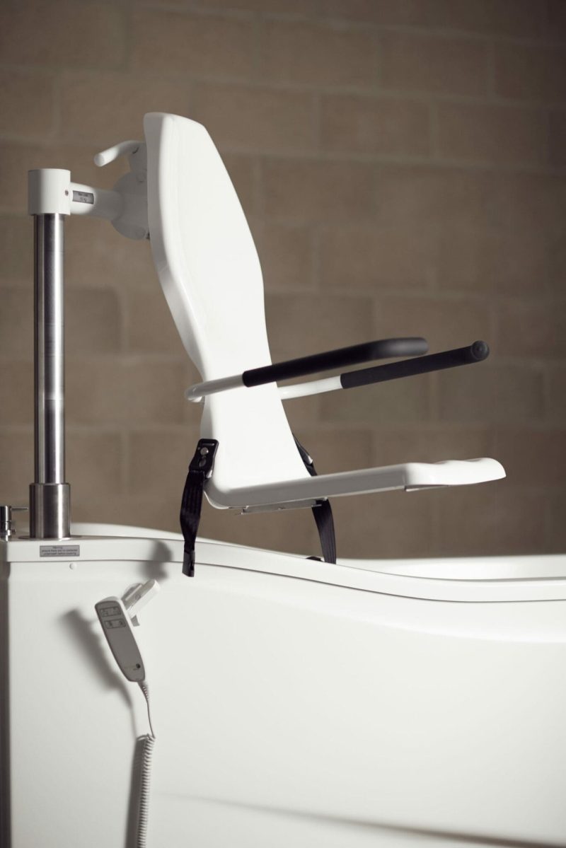 Astor Compact Plus assisted bath with tilt and spa options. Seat raised.