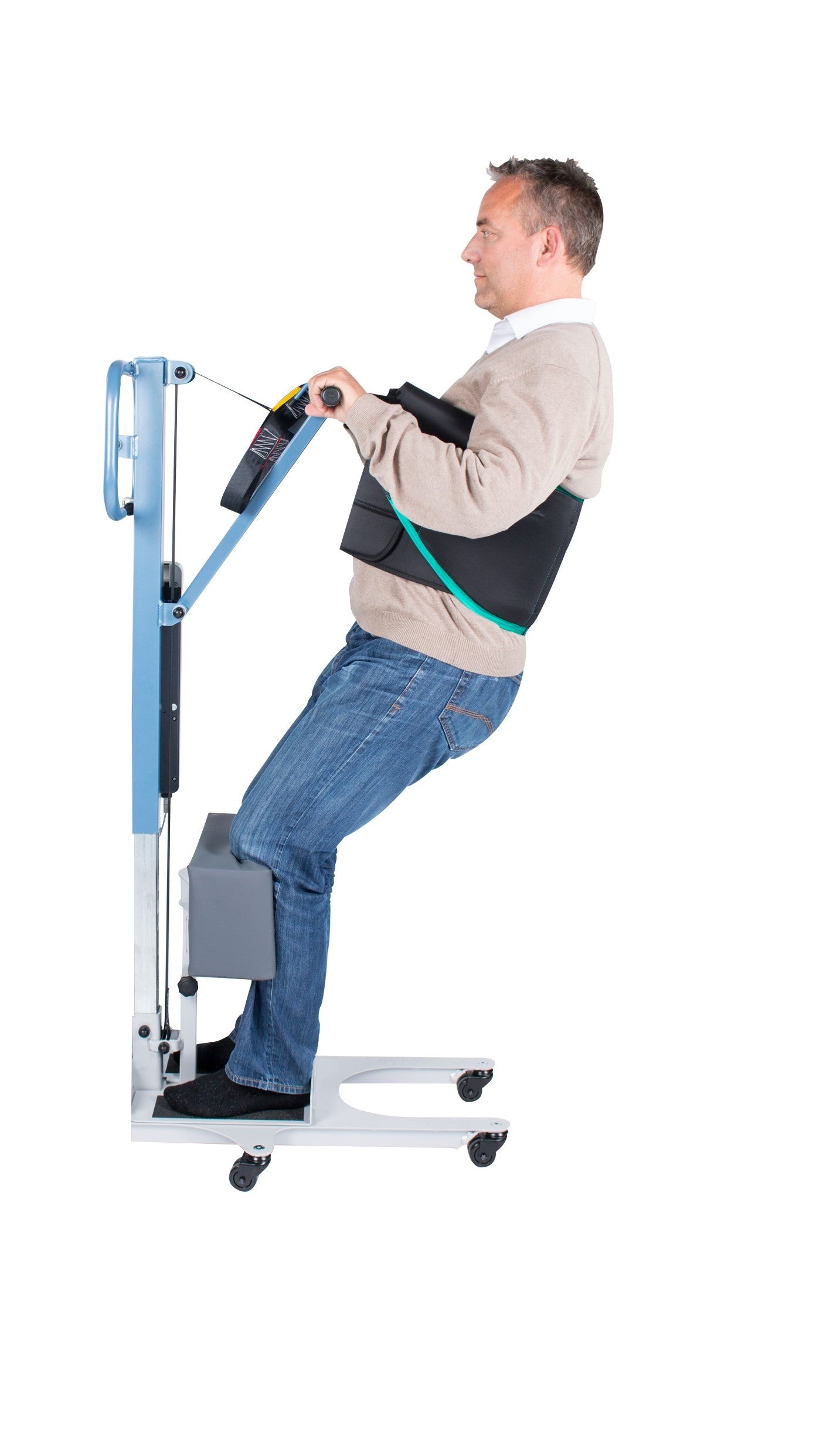 “Wellell Active Sling in use on an active hoist, showing user supported in padded sling with abdominal belt.