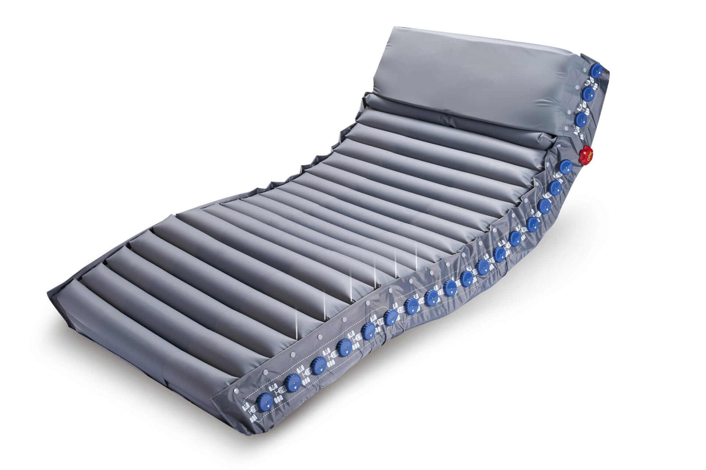 Optima Prone prone-position mattress fitted on a hospital bed, showing the full alternating air cell surface and shoulder-lift section.