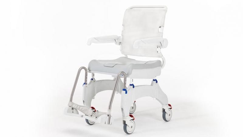 Side profile of Ocean Ergo shower commode chair with swing-away armrests and flip-up footplates