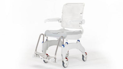 Side profile of Ocean Ergo shower commode chair with swing-away armrests and flip-up footplates