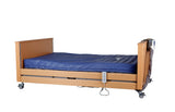 Wellell Pro Bario Bariatric Profiling Bed with beech finish.
