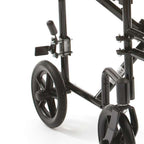 Side view of ATC19 travel chair folded for transport