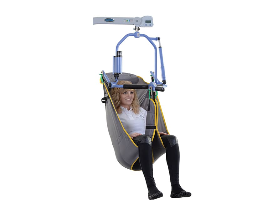 Oxford Comfort Sling fitted on a 4-point positioning cradle hoist, supporting user’s full body during passive transfer.