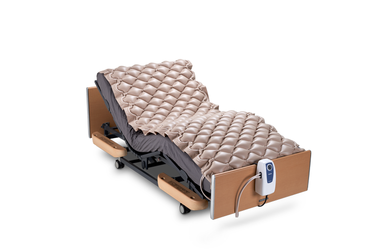 Wellell Domus 1 alternating pressure mattress overlay displayed on a standard hospital bed.