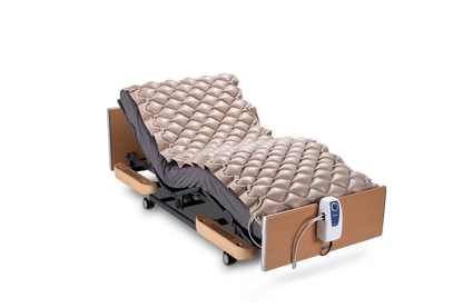 Wellell Domus 1 alternating pressure mattress overlay displayed on a standard hospital bed.