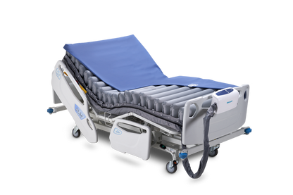 Wellell Domus Auto Bariatric alternating pressure mattress system displayed on a hospital bed.
