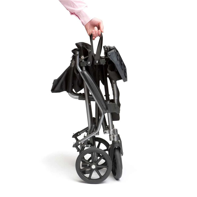 Aluminium Lightweight Wheelchair Folded and being carried