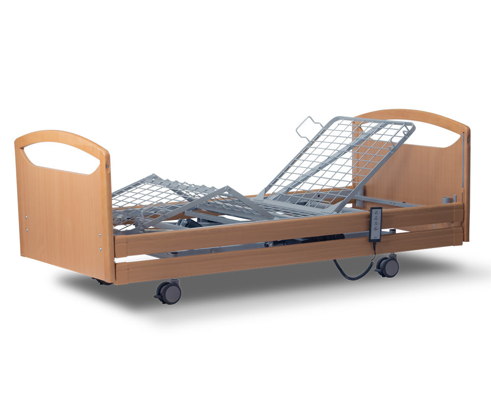 Compact scissor-lift chassis providing under-bed clearance for hoists.