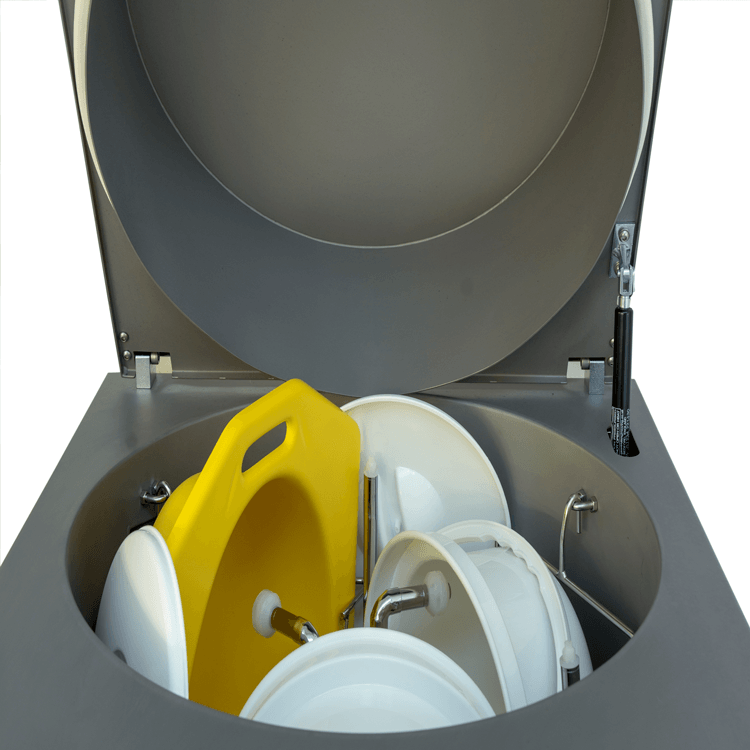 CS3 HD COMPACT SUPERIOR WASHER/DISINFECTOR showing toilet seats and bedpans inside the machine.
