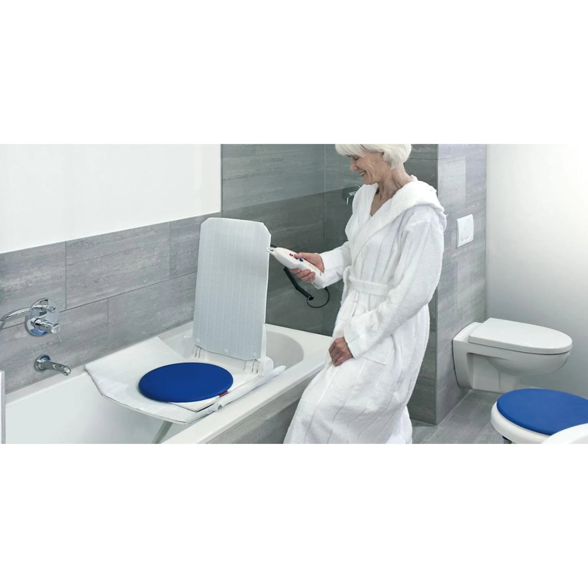 Side view of Invacare Aquatec Orca securely installed in bathtub showing compact design
