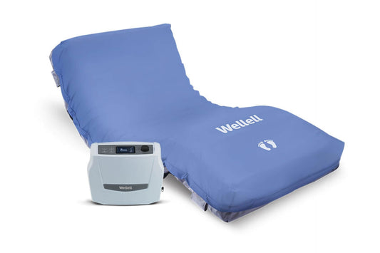 Full view of the optima prone mattress highlighting it's cover design and pump design.