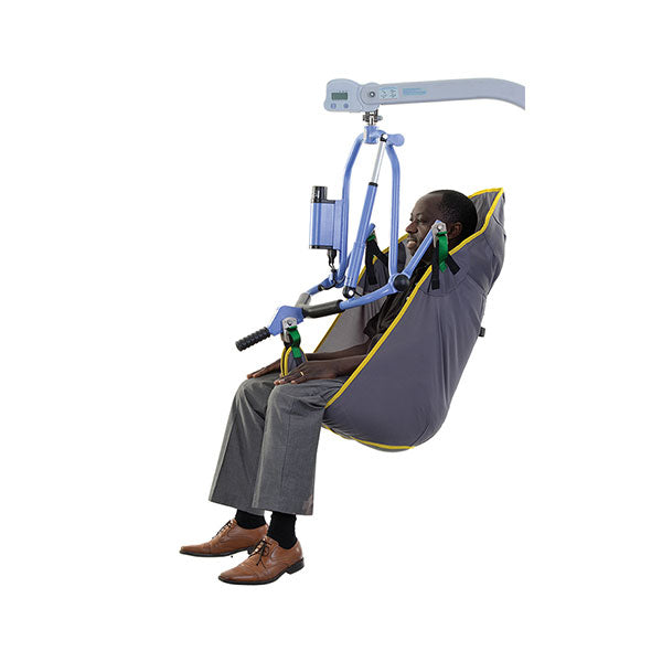 Oxford Full Body Sling with Clips in use on a hoist, supporting user’s full back and thighs.