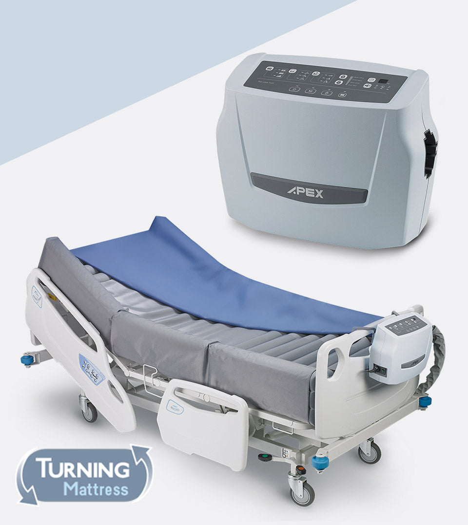 Wellell Optima Turn lateral rotation mattress system placed on a hospital bed, showing full setup