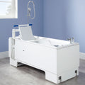 Excel 600 height adjustable bath front view with detachable powered swing seat and transporter